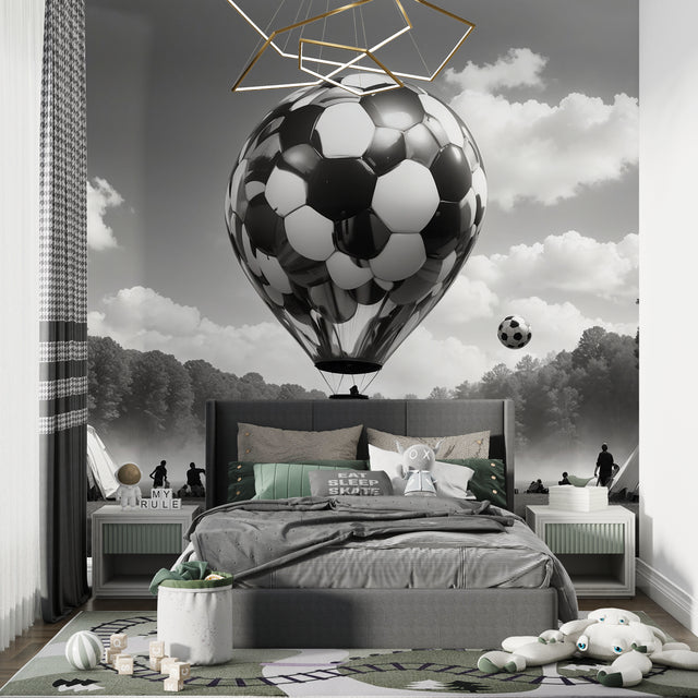 Football balloon wallpaper in modern teen bedroom showing black and white design with dramatic lighting