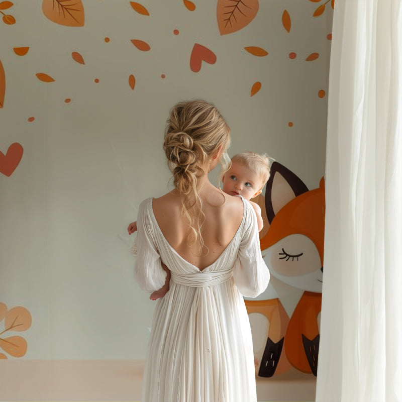 Forest theme wallpaper adding charm to a toddler bedroom