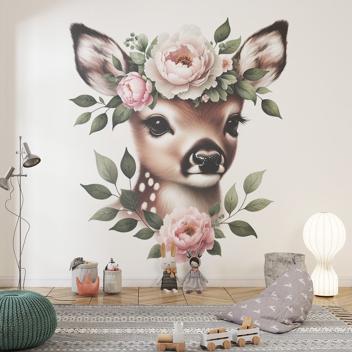 Forest animal wallpaper with deer and pink peonies shown in a bright nursery setting with white furniture