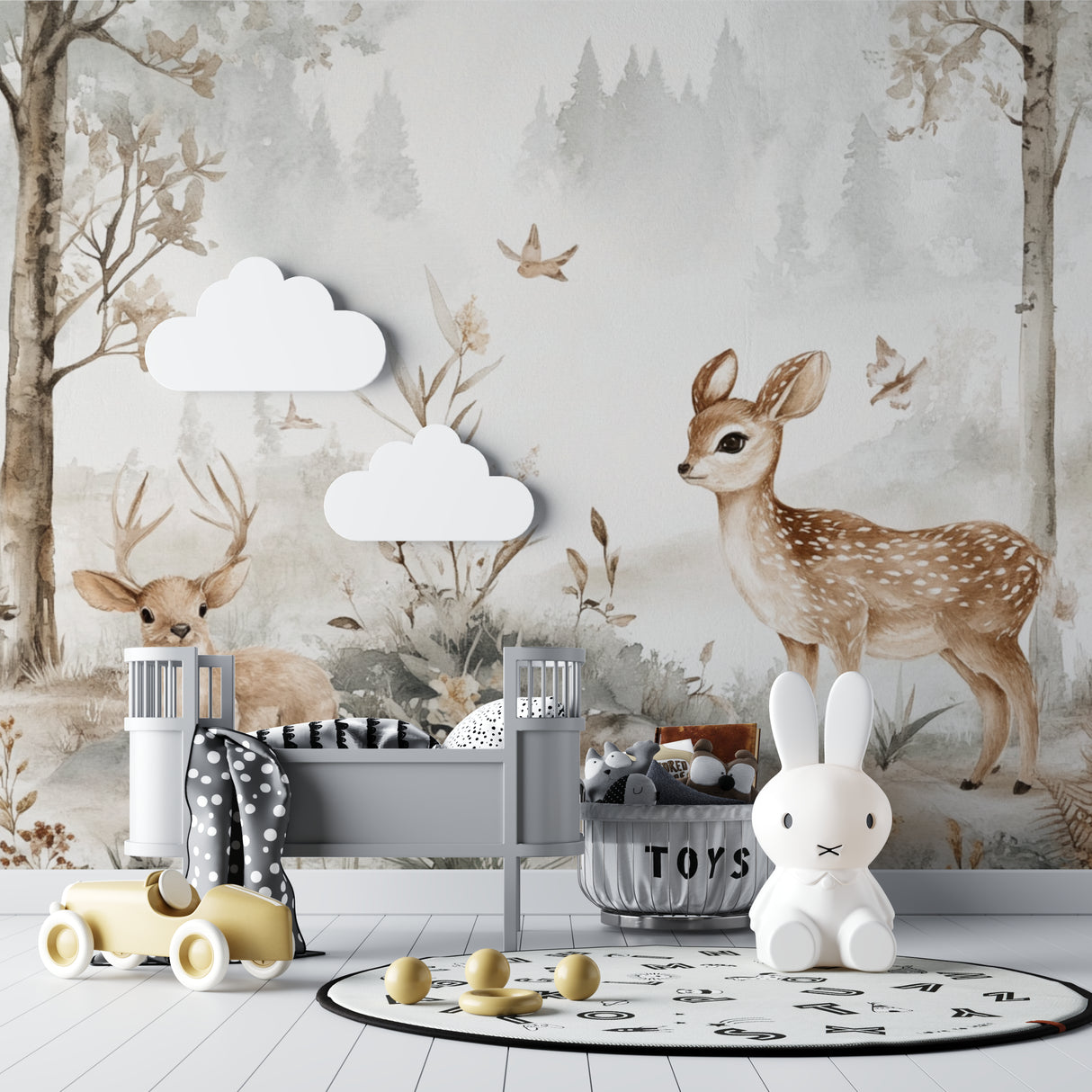 Woodland mural creating serene atmosphere in baby's room with white furniture