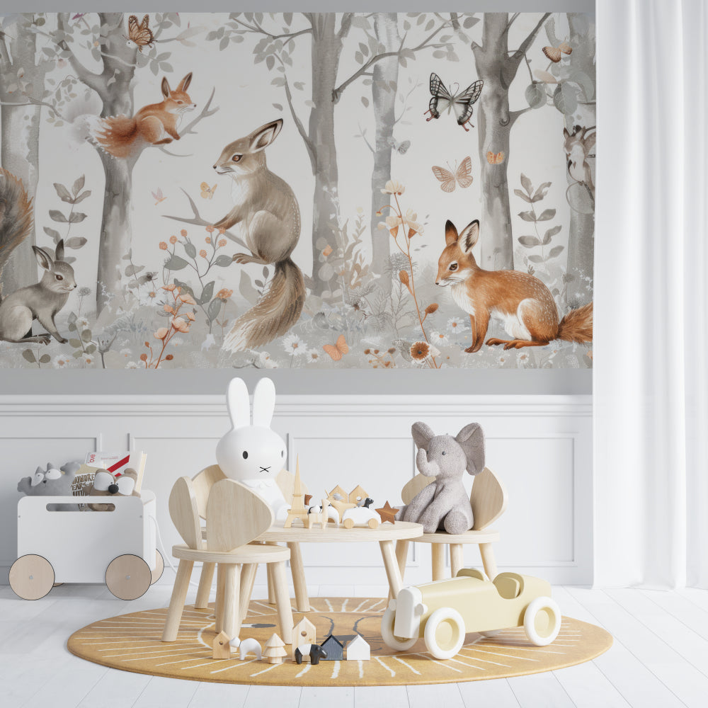 Forest scene wall mural bringing nature into baby room with wooden crib