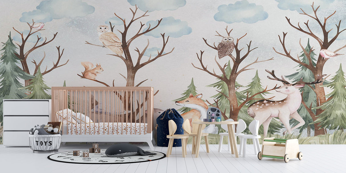 Forest animals wallpaper creating a cozy atmosphere in a modern nursery with white furniture