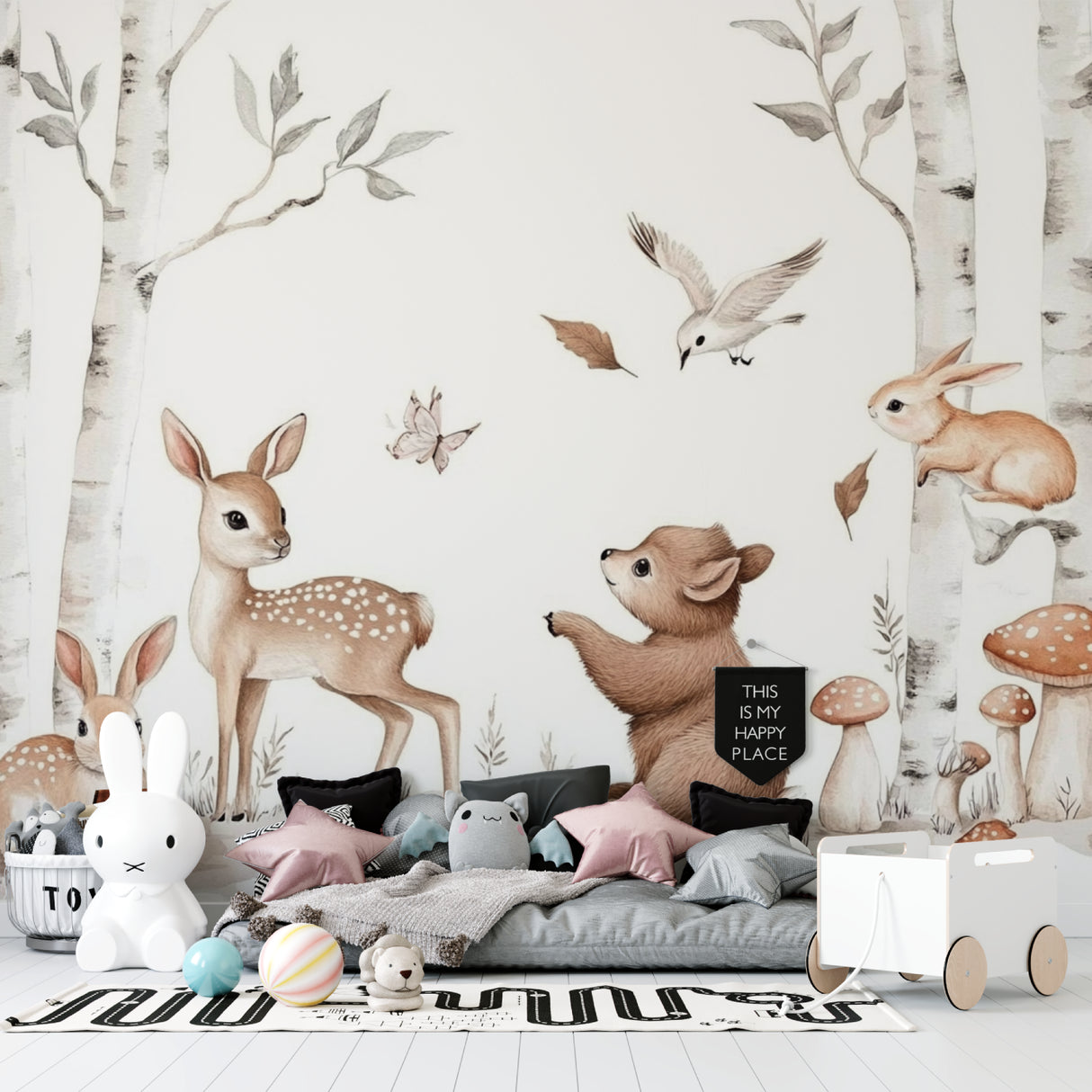 Nursery forest wallpaper creating a peaceful setting in a toddler's bedroom
