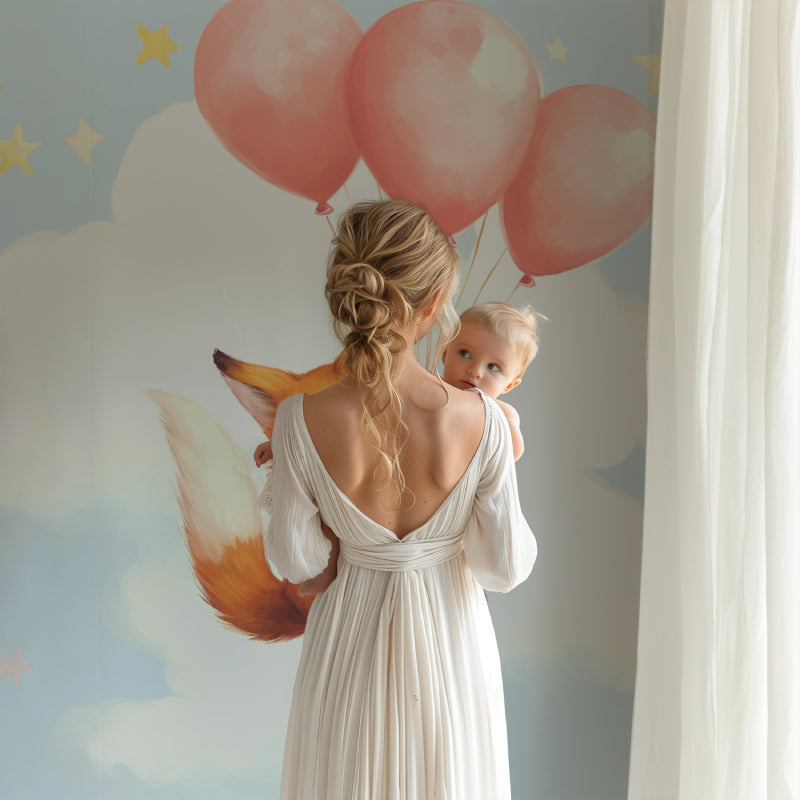 Fox wallpaper with pink balloons in baby girl nursery with white furniture