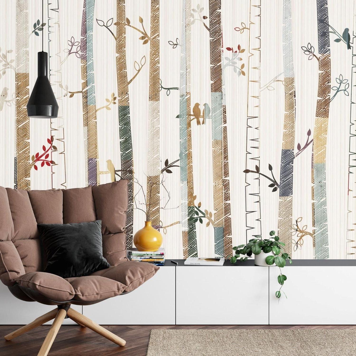 Dining room featuring nature-inspired birch tree wall mural