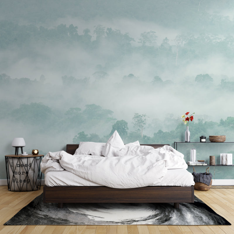 Watercolor mountain landscape mural in dining room, enhancing space with misty forest views