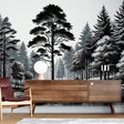 Black and white forest mural creating depth in a modern living room with minimal furniture