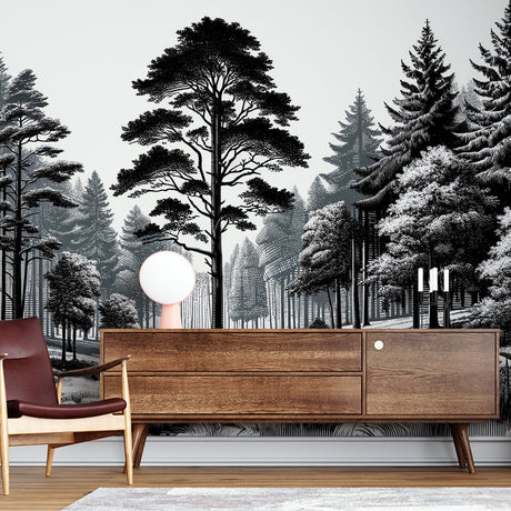 Black and white forest mural creating depth in a modern living room with minimal furniture