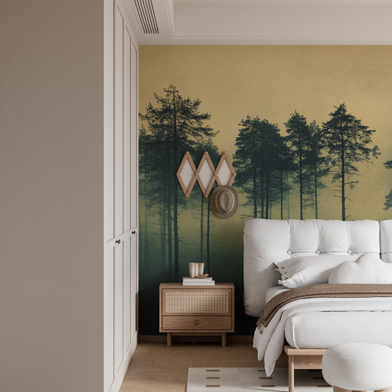 Misty pine tree wallpaper in cozy bedroom setting with minimal furniture