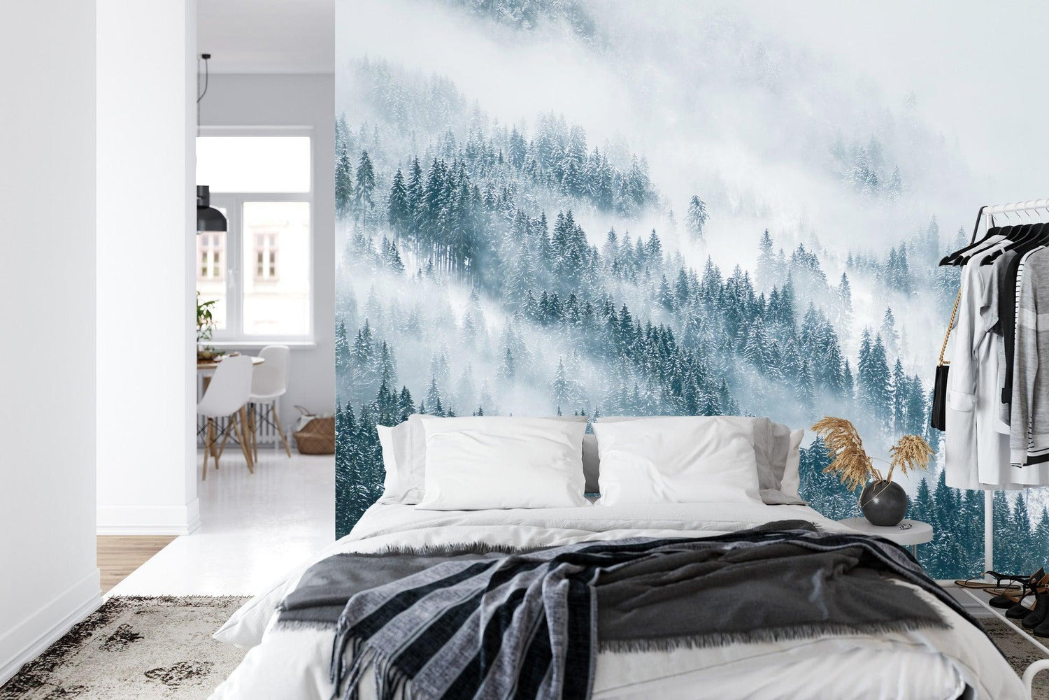 Forest mural wallpaper creating depth in modern living room with grey sofa and natural light