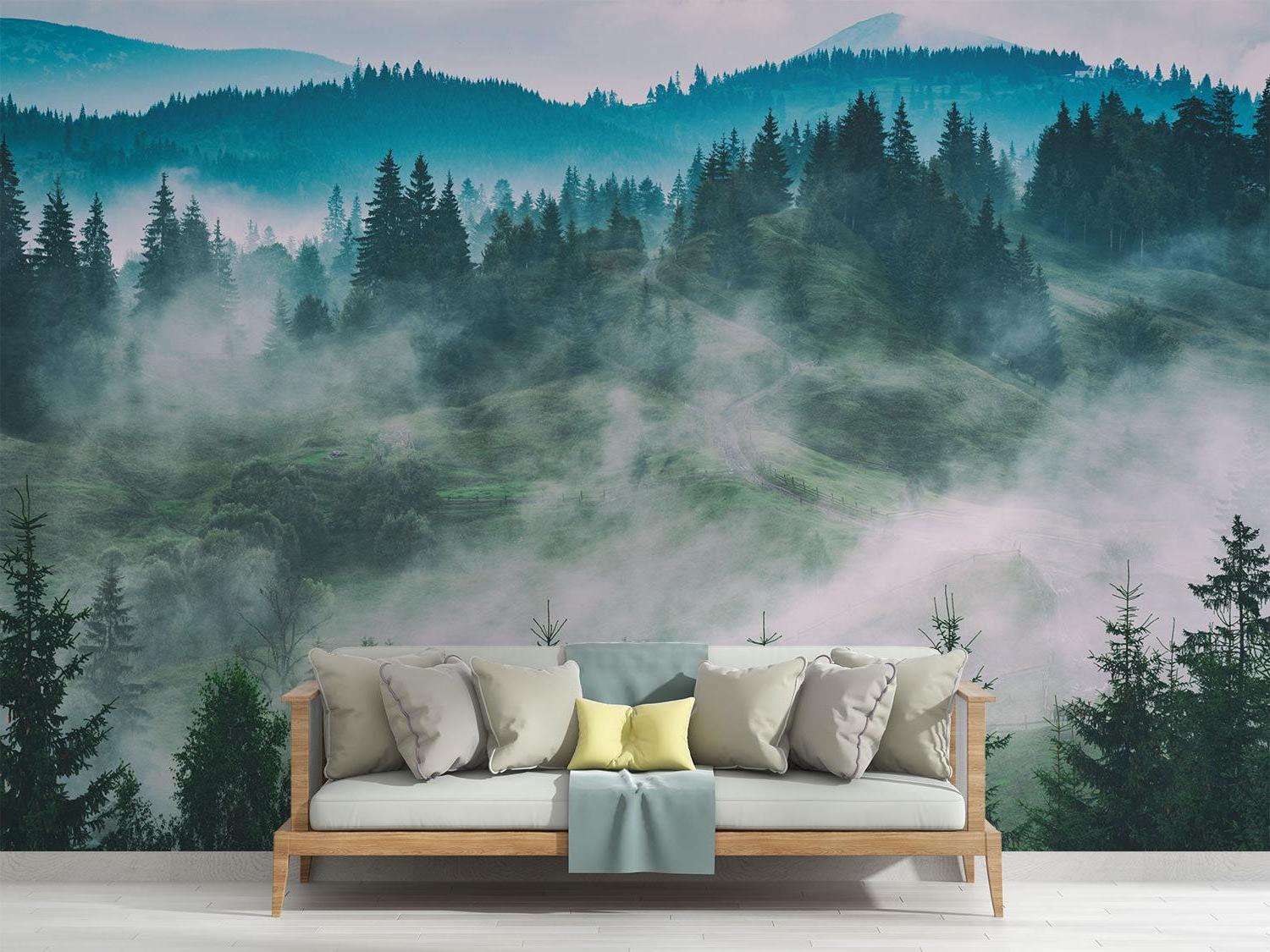 Misty pine forest wallpaper in cozy bedroom setting with wooden furniture