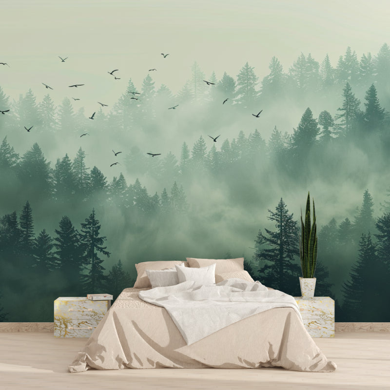 Bedroom transformed with misty forest wallpaper, pine trees adding natural charm