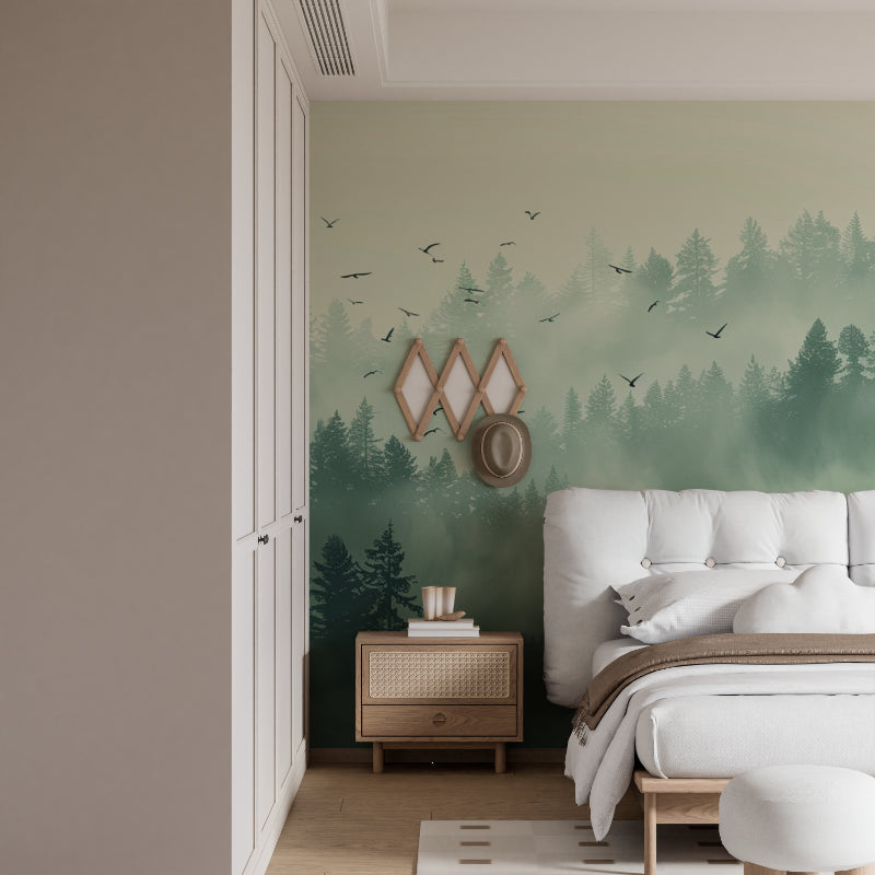 Reading nook with forest mural wallpaper showing misty morning scene