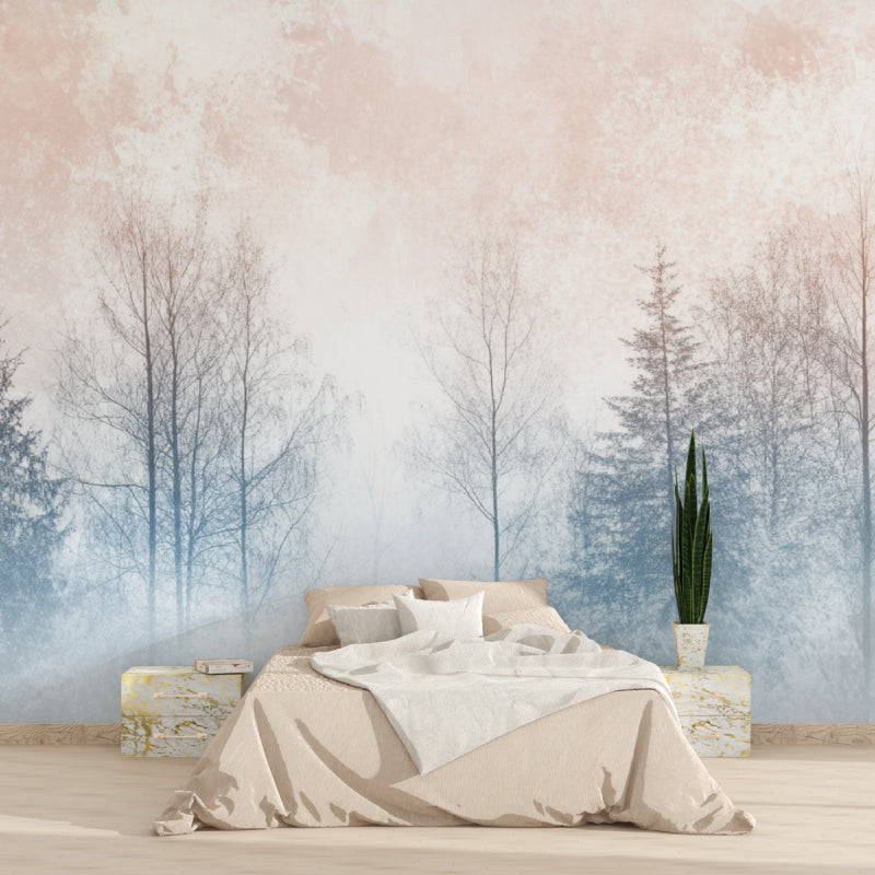 Home office space with calming misty tree wallpaper and minimal desk setup