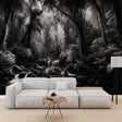 Black and white forest waterfall mural wallpaper creating depth in a modern living room with minimal furniture