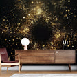 Galaxy wallpaper with gold accents creating a stunning focal point in a modern living room with minimal furniture