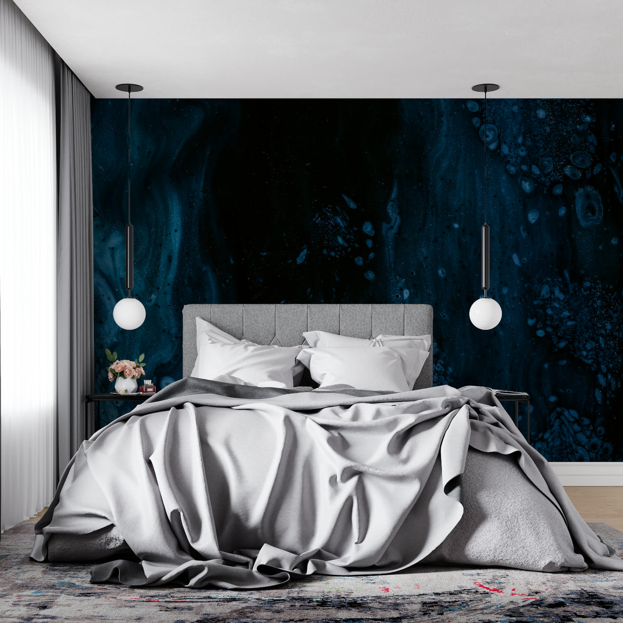 Deep blue galaxy wall mural in child's bedroom with space-themed decor
