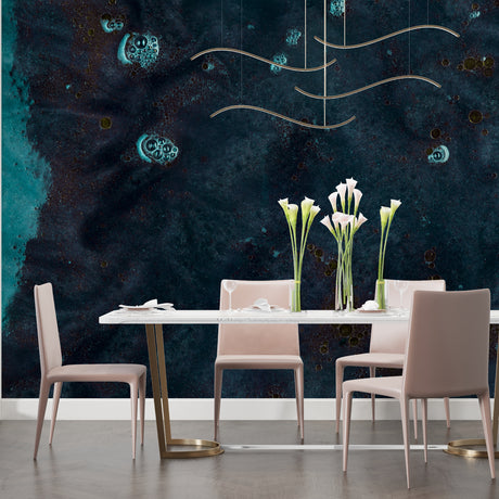 Galaxy wallpaper in modern bedroom creates dreamy night sky atmosphere with deep teal and golden accents