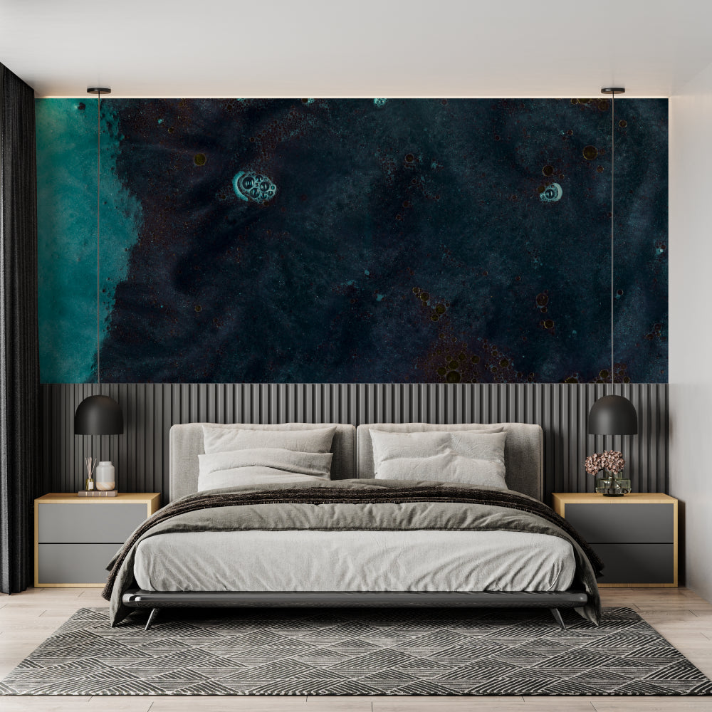 Home office space featuring cosmic wallpaper with abstract galaxy pattern in rich teal tones