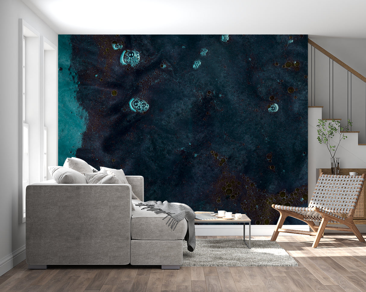 Dining area showcasing abstract galaxy wall mural in deep teal with golden details