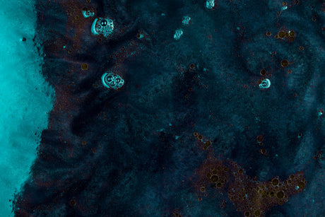 Design file showing detailed galaxy pattern with flowing teal nebulae and golden accents