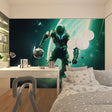 Futuristic football gaming wallpaper in modern teen bedroom, green neon glow highlighting gaming setup