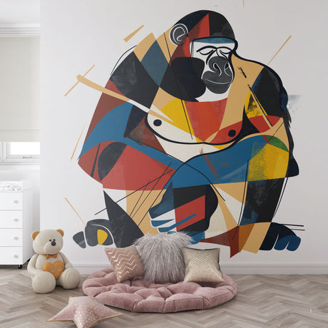Geometric Gorilla wallpaper creating a stunning focal point in a modern living room with grey furniture