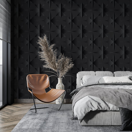 Modern living room with 3D geometric black diamond wallpaper creating depth behind grey sofa