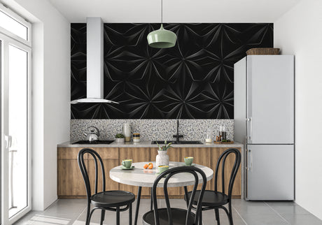 Black geometric 3D floral wallpaper in modern minimalist living room with grey sofa and metal accents