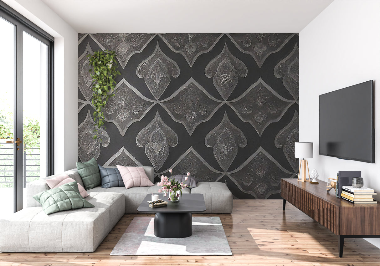 Grey geometric Art Deco wallpaper in modern living room with grey sofa and metallic accents