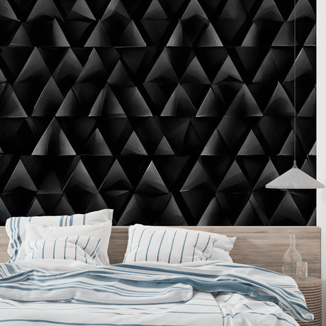 Modern living room with black geometric 3D triangle wallpaper creating depth and sophistication