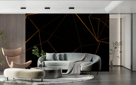 Geometric black and gold wallpaper in modern living room creating dramatic luxury atmosphere