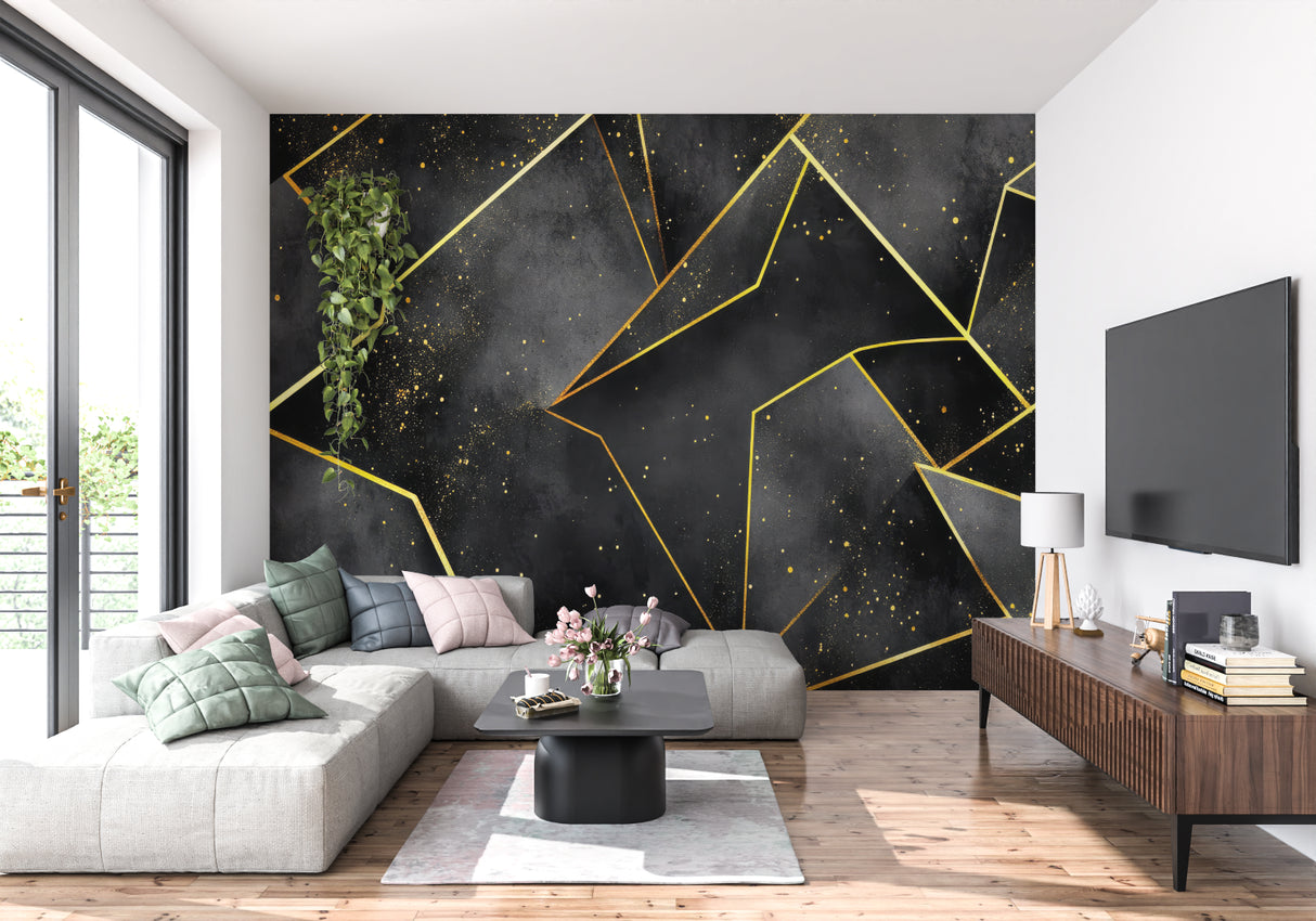 Black and gold geometric wallpaper creating drama in a modern living room with high ceilings