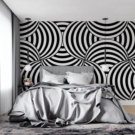 Modern black and white geometric wallpaper in minimalist living room creating dramatic focal wall