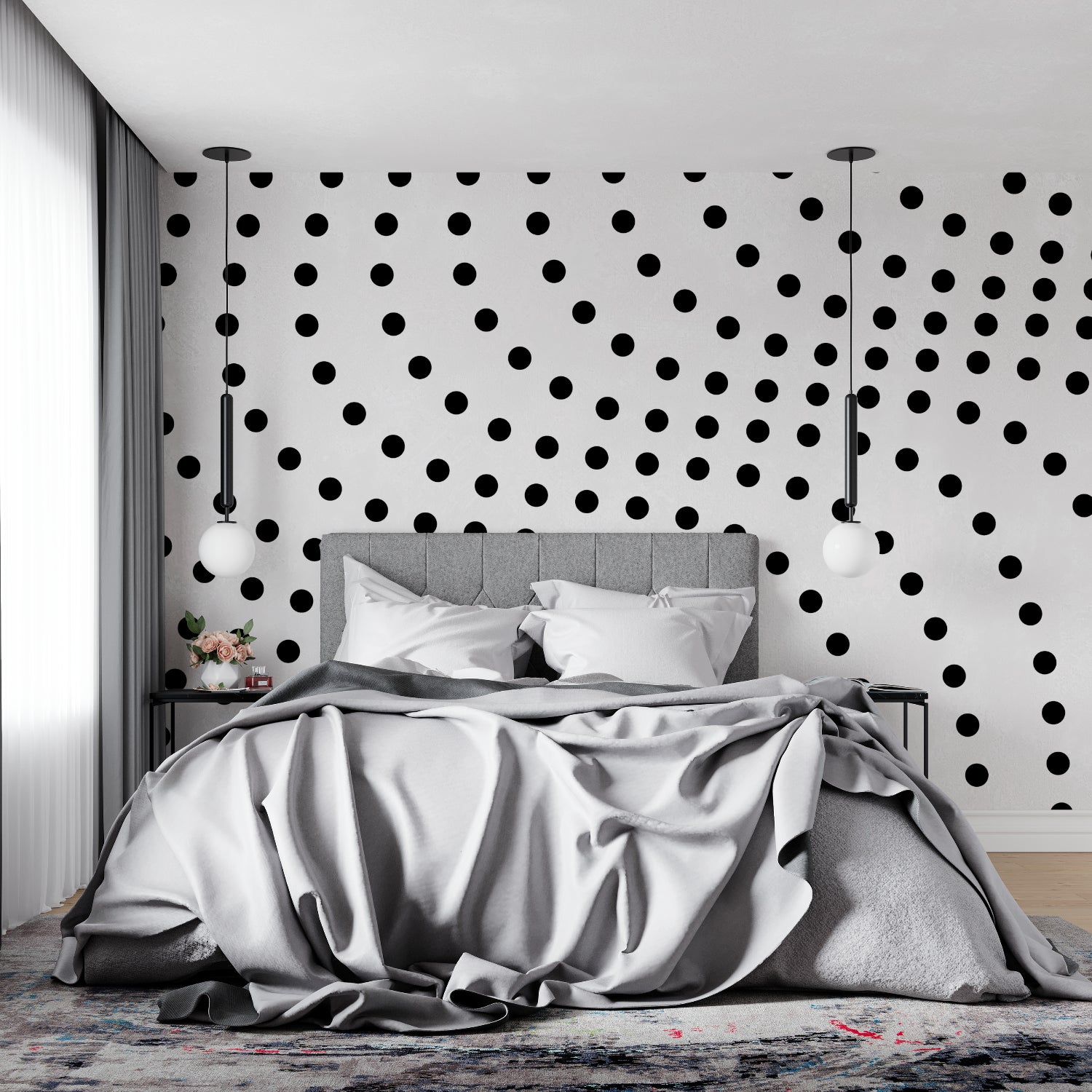 Polka dot wallpaper making a bold statement in a minimalist bedroom