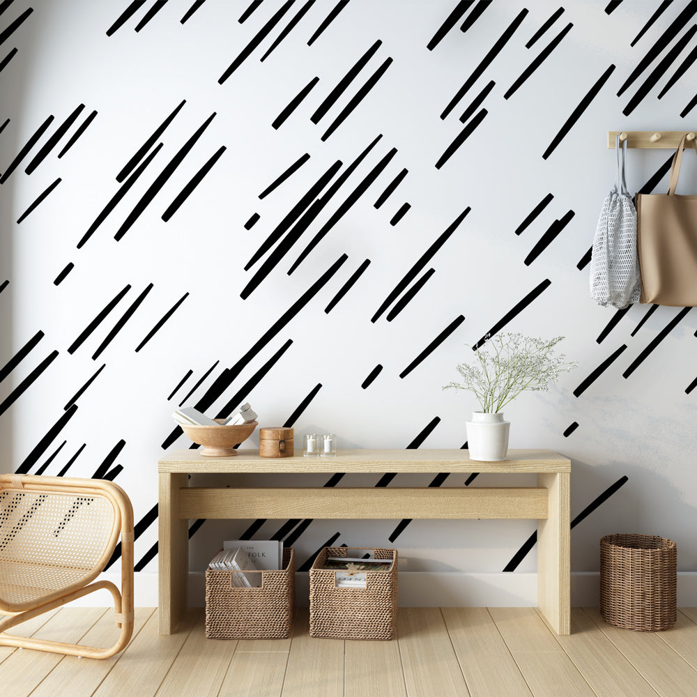 Black geometric line pattern wallpaper in a modern minimalist living room with natural light and contemporary furniture