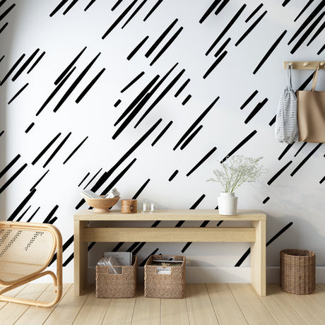 Black geometric line pattern wallpaper in a modern minimalist living room with natural light and contemporary furniture