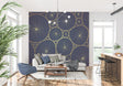 Modern geometric wallpaper with blue and gold circles creating depth in a minimalist living room