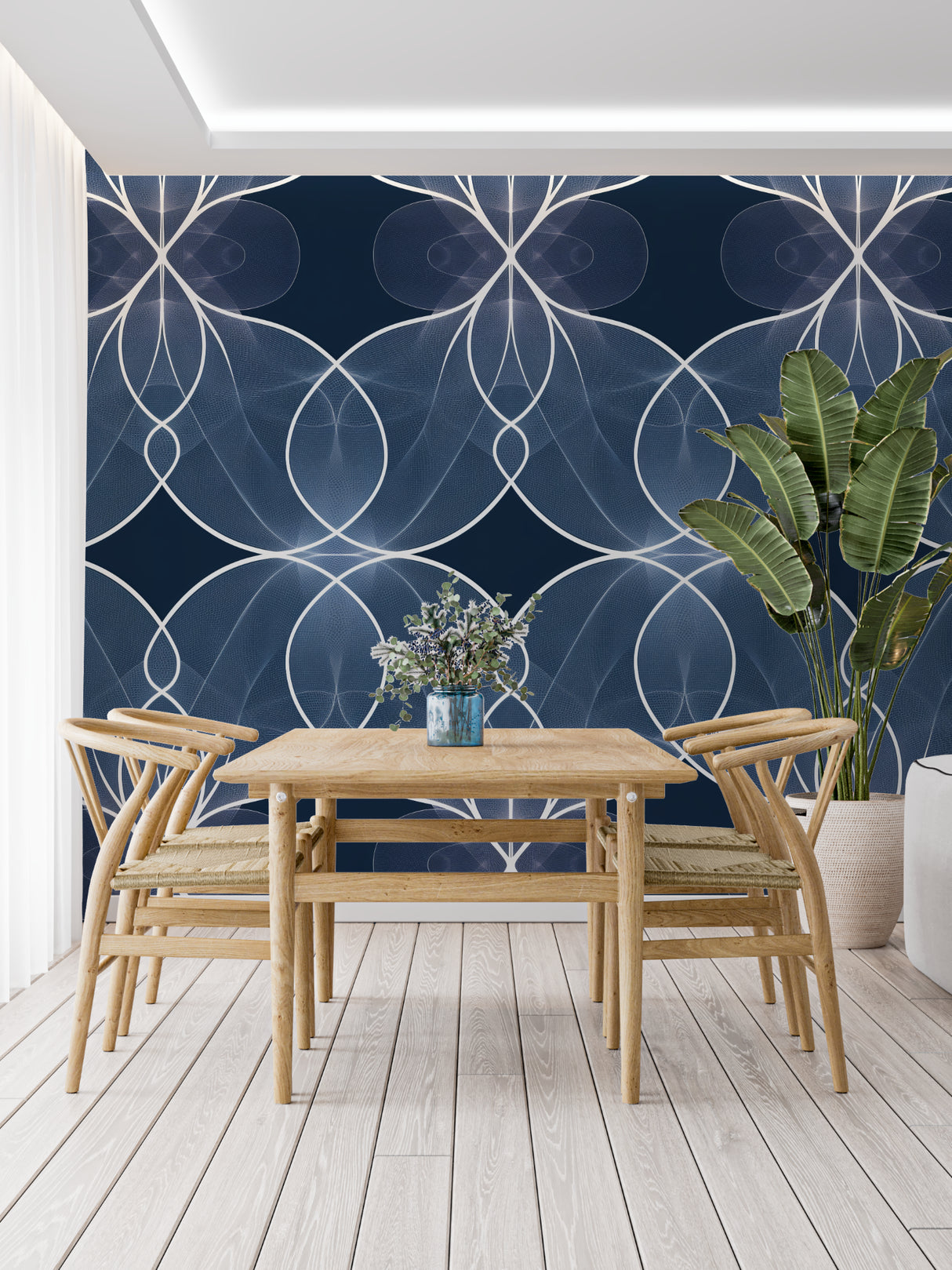Geometric art deco wallpaper with silver pattern in modern living room setting, blue and silver tones create depth
