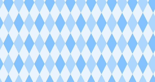 Modern blue geometric wallpaper in a bright home office showing diamond pattern creating depth and visual interest