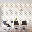 Geometric diamond wallpaper in modern living room showing black and white pattern creating depth