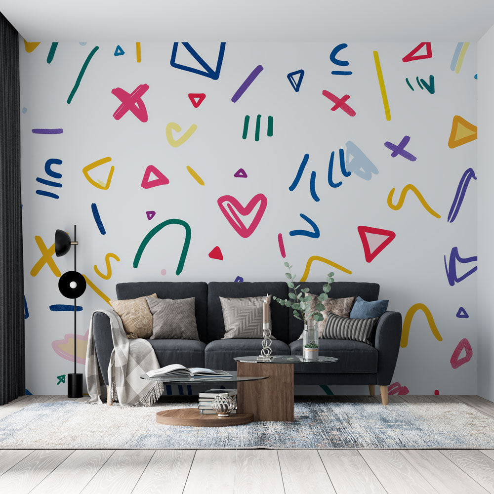 Geometric pattern wallpaper bringing vibrant energy to a modern living room with white furniture