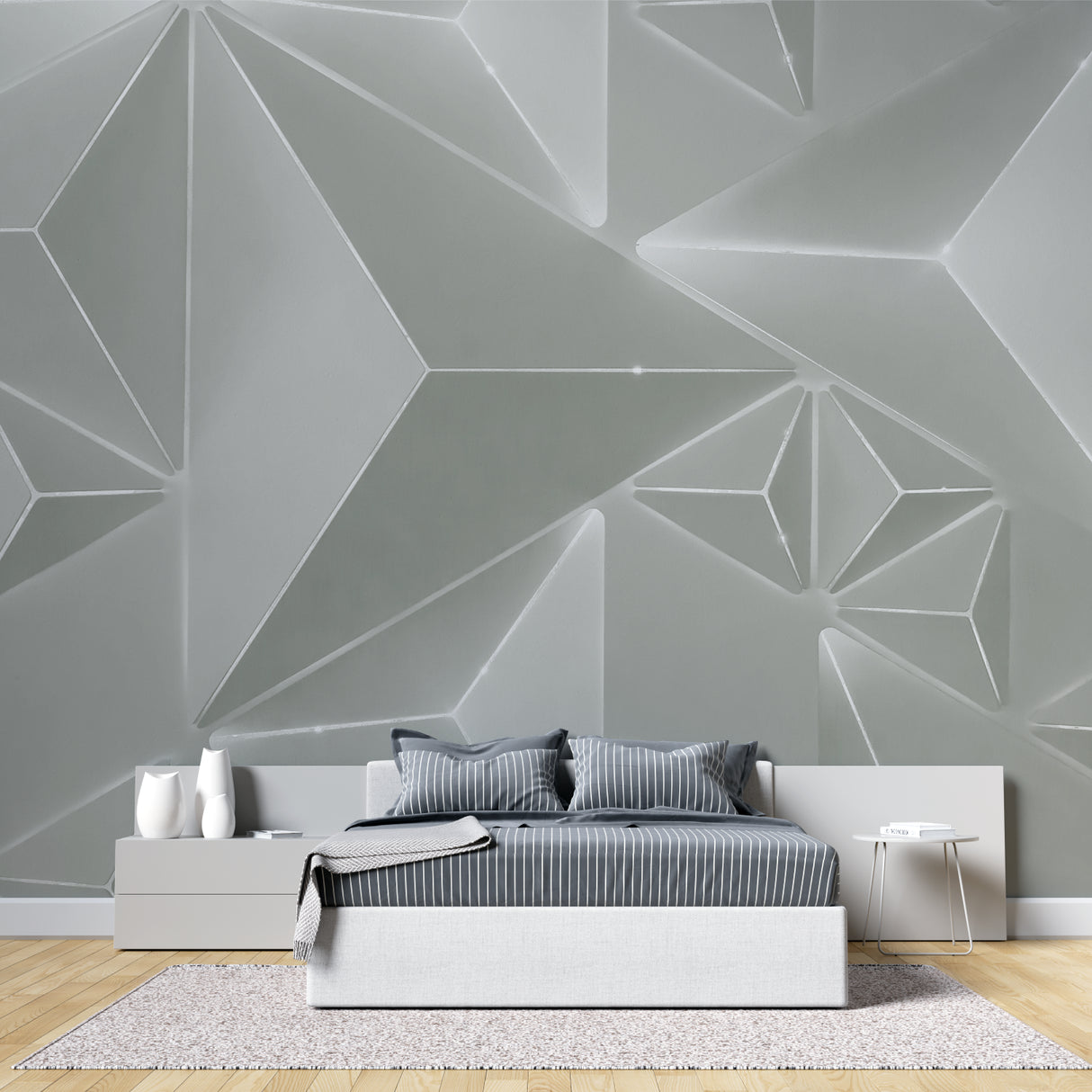 Modern 3D geometric wallpaper in contemporary living room with grey sofa and minimal decor