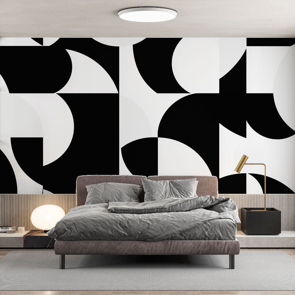 Modern geometric wallpaper in a bright living room showing black and white abstract pattern creating depth and movement