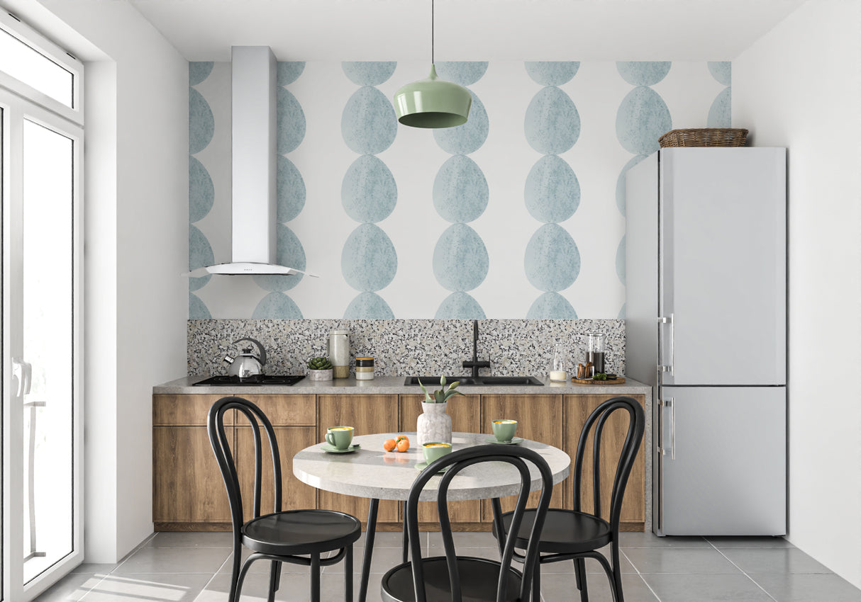 Blue circular pattern wallpaper in a modern dining room with natural light