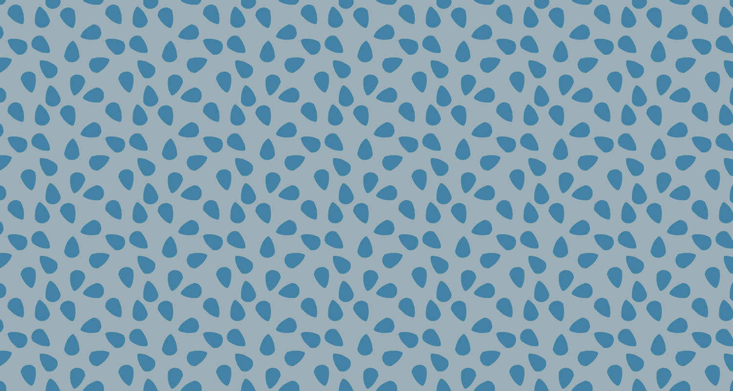 Modern geometric blue droplet wallpaper in a bright minimalist living room, creating a fresh and open atmosphere