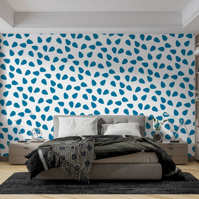 Modern geometric blue drops wallpaper in a bright contemporary home office showing flowing pattern and natural light