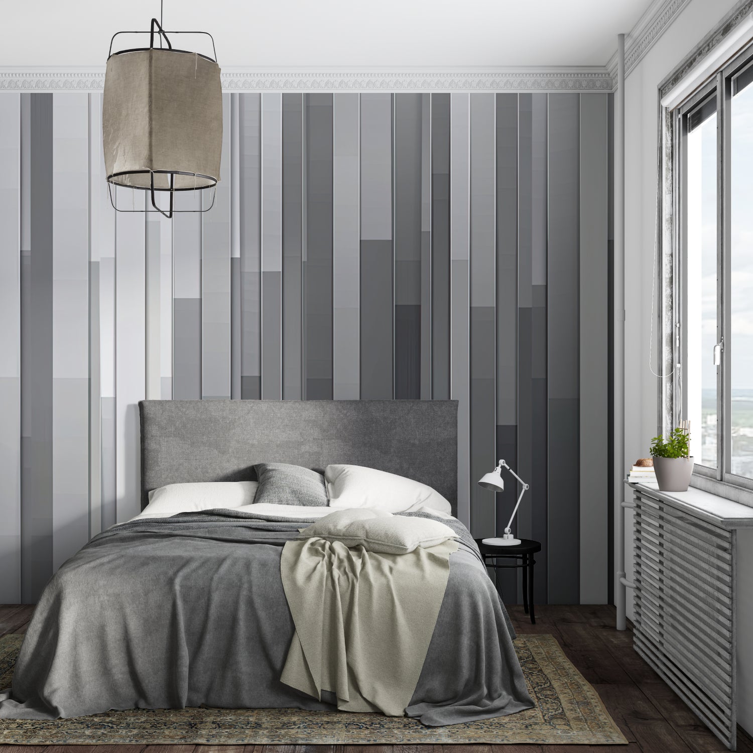 Modern grey stripe wallpaper in a minimalist living room with natural light highlighting the gradient pattern