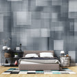 Modern grey geometric wallpaper in a minimalist office space, creating a clean and professional atmosphere