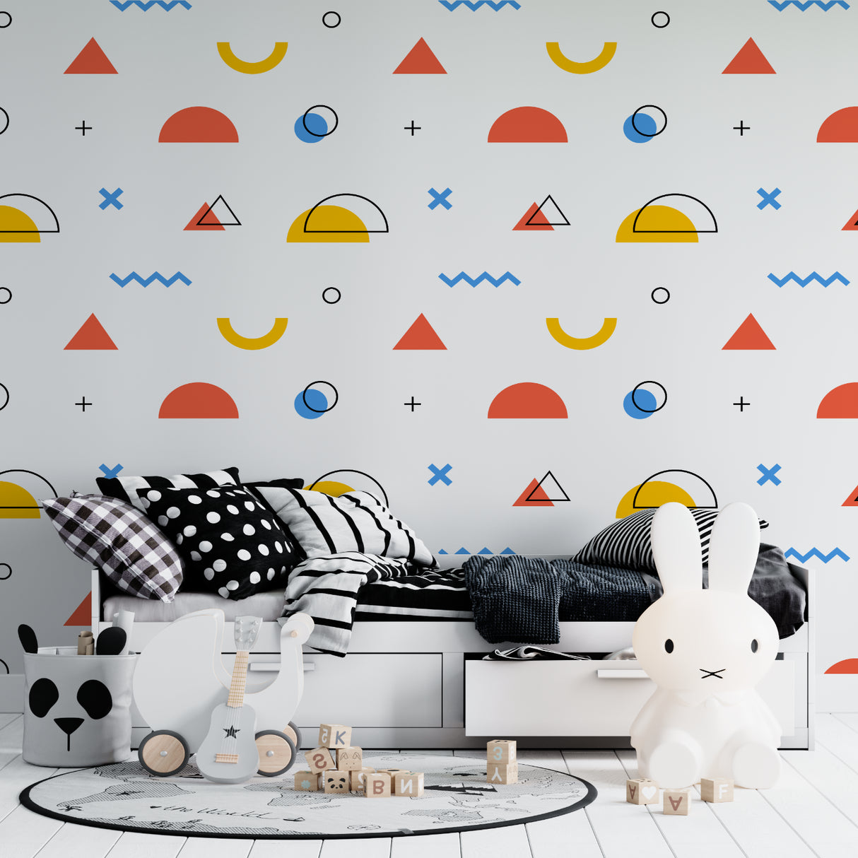 Cheerful geometric wallpaper in a bright study space showing orange and blue patterns